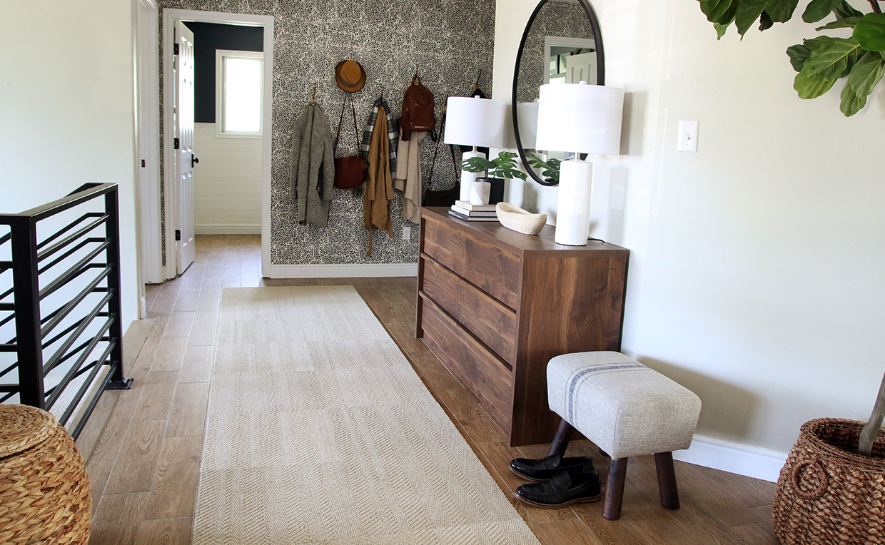 Blog8_1240x764_01.jpg Main entryway, hallway with dresser and coat rack