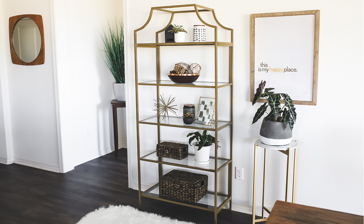 Blog_Fave_Storage_1240x764_07.jpg Gold metal and glass tower bookcase in dining room