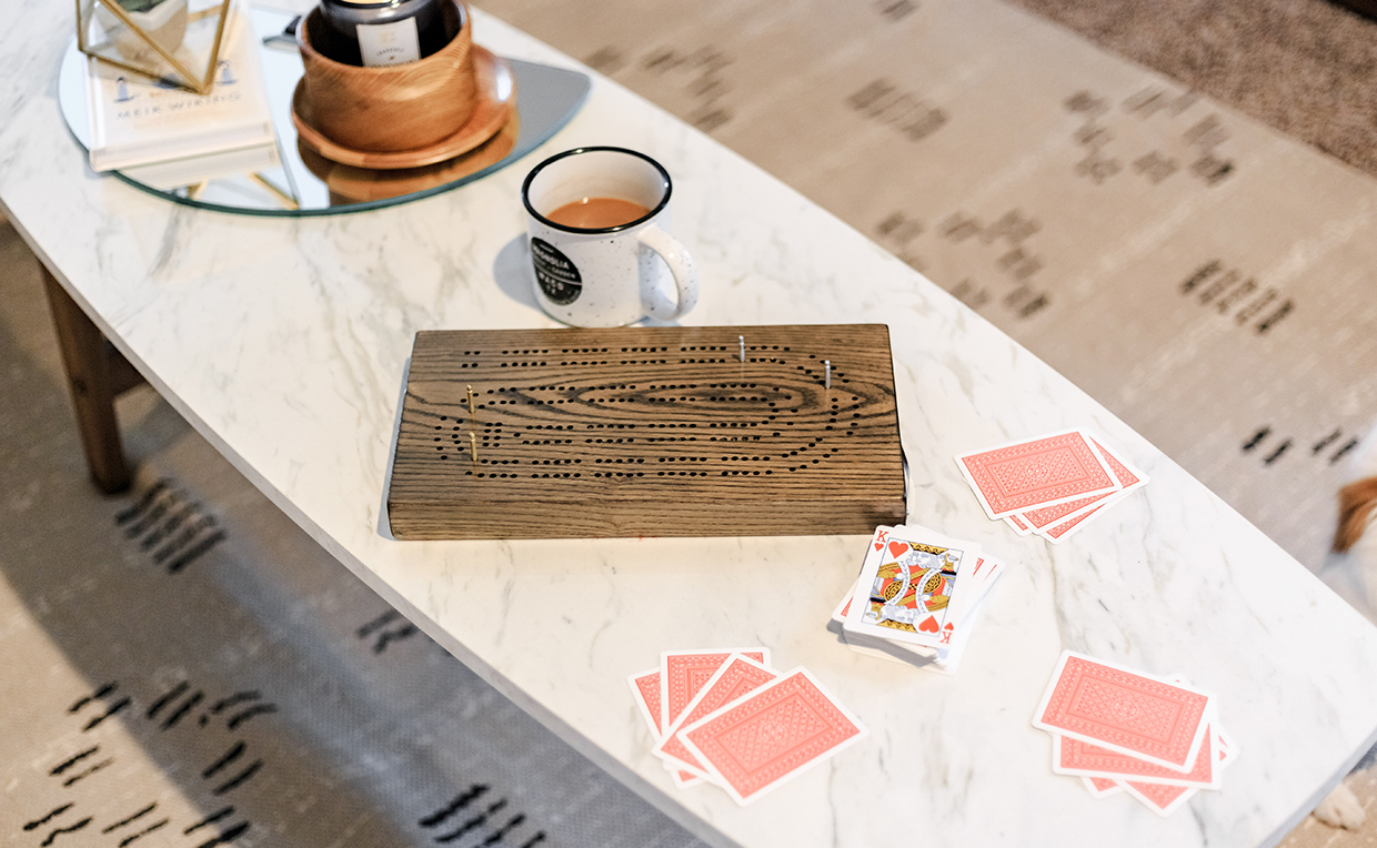 Blog3_1240x764_13.jpg Coffee table, relaxing, living room furniture, cozy, board game, card game, cribbage