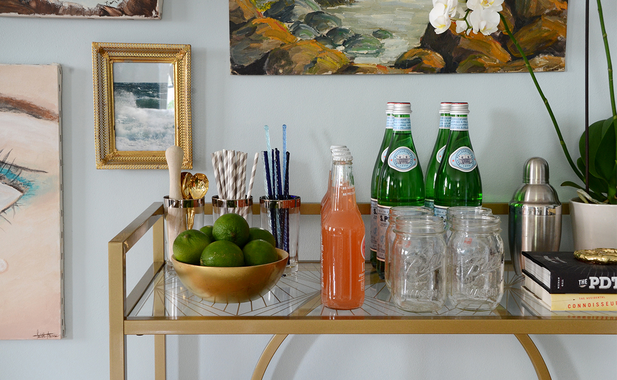 SmallSpaceEntertainingDrinks.jpg Bar cart with mason jars and straws for party drinks.