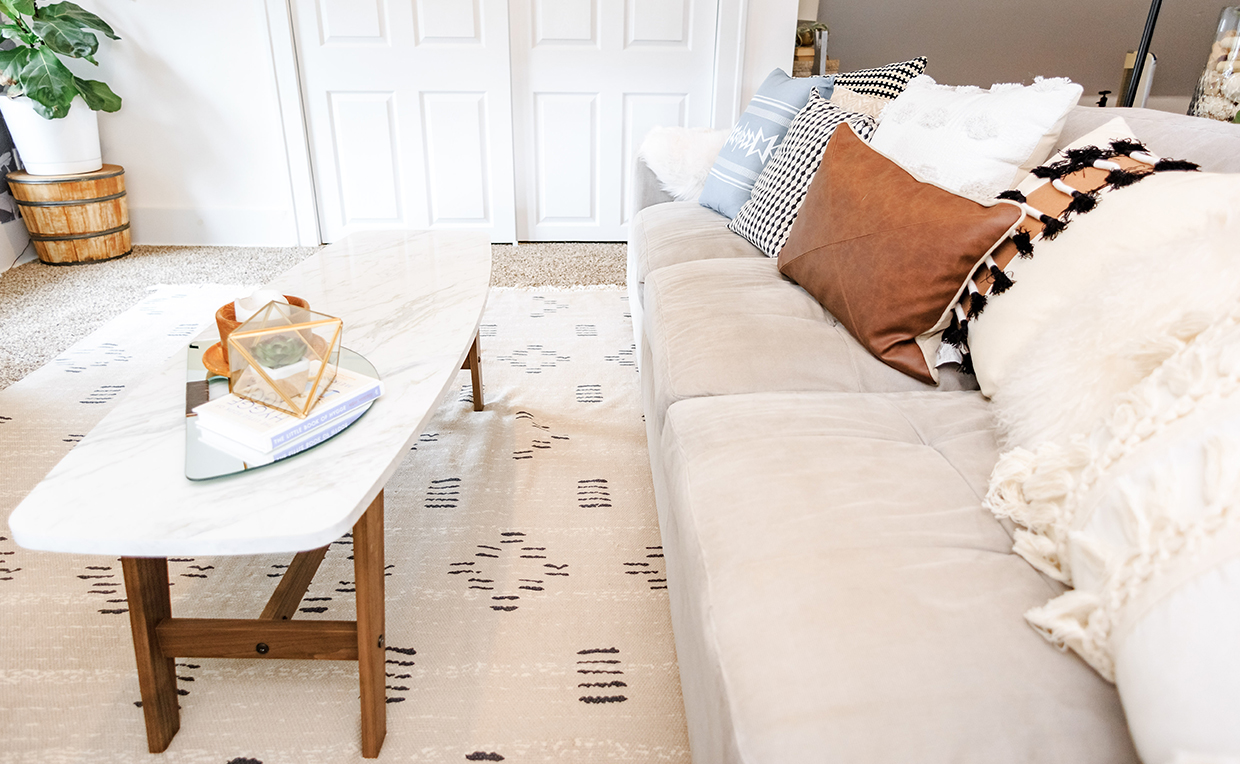 Blog6_1240x764_01.jpg Couch and coffee table with rug